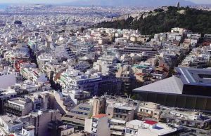 View over the apartment buildings of Athens toward the hills